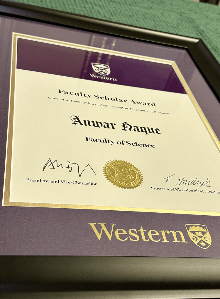 Dr. Haque receiving the Western University's Faculty Scholar Award